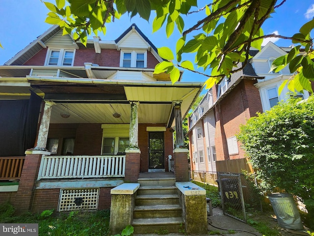 view of front of home featuring covered porch