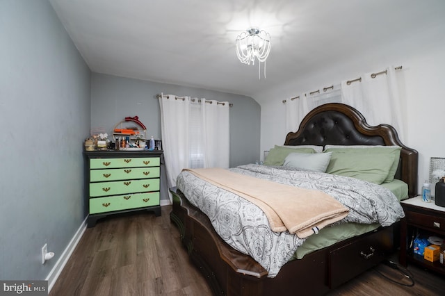 bedroom with hardwood / wood-style floors