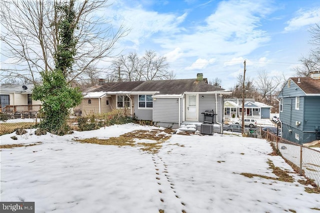 view of snow covered property