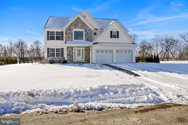 front of property with a garage