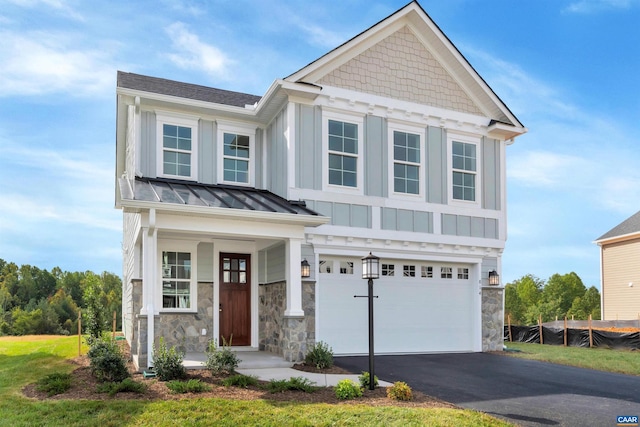 craftsman-style home with a garage