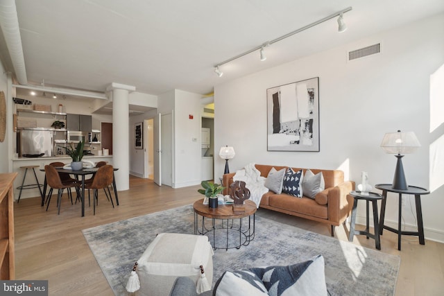 living room featuring light hardwood / wood-style floors