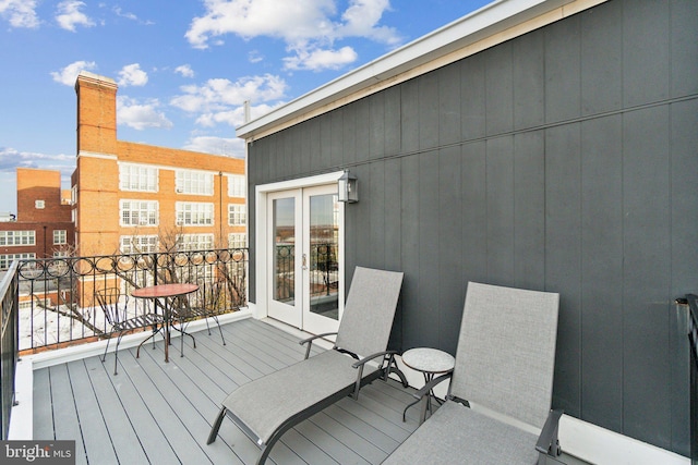 wooden terrace featuring french doors