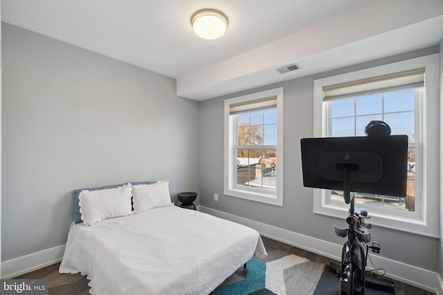 bedroom featuring dark hardwood / wood-style floors