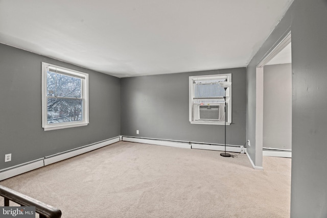 unfurnished room with carpet, cooling unit, and a baseboard radiator