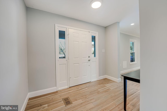 entrance foyer with light hardwood / wood-style floors