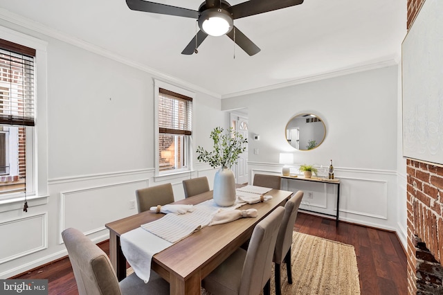 dining space featuring crown molding, ceiling fan, and dark hardwood / wood-style flooring