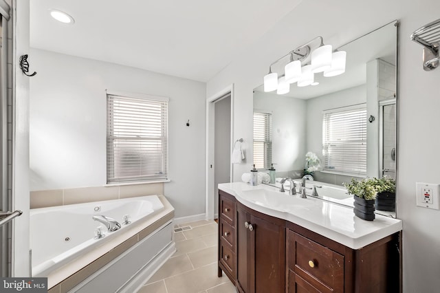 bathroom featuring vanity, tile patterned floors, and separate shower and tub