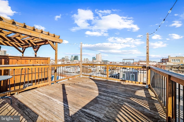 wooden terrace featuring a pergola