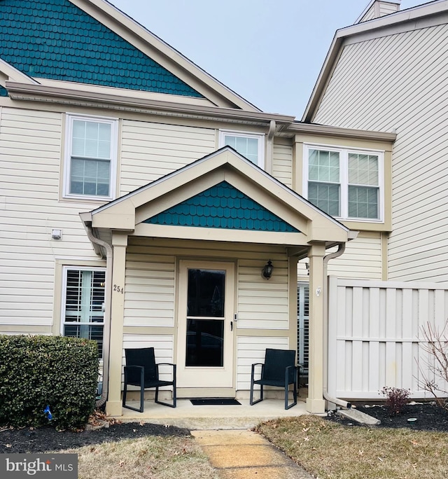 property entrance with a patio area