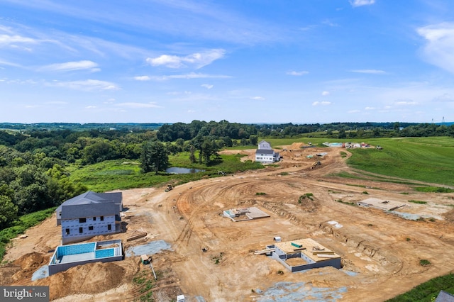 aerial view featuring a water view and a rural view