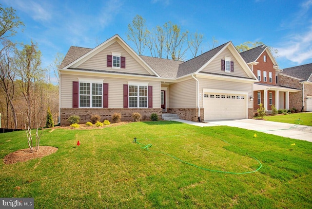 craftsman-style home with a front yard and a garage