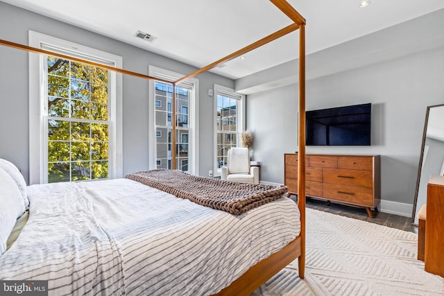 bedroom featuring wood-type flooring