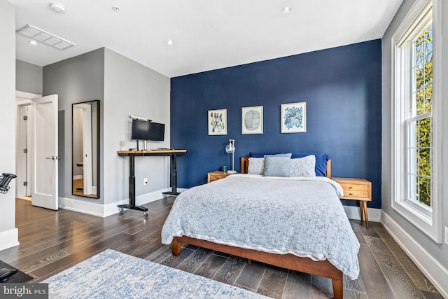 bedroom featuring dark wood-type flooring