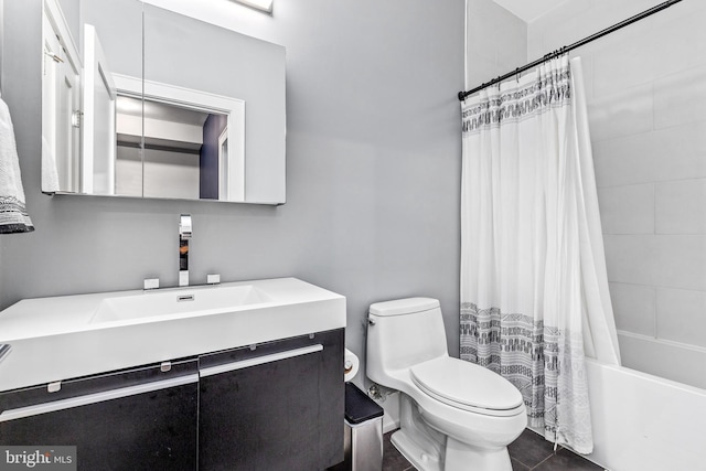 full bathroom with vanity, toilet, shower / bath combo with shower curtain, and tile patterned flooring