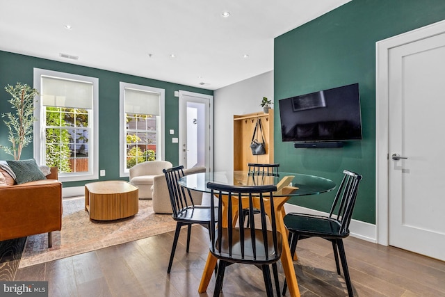 dining room with hardwood / wood-style floors