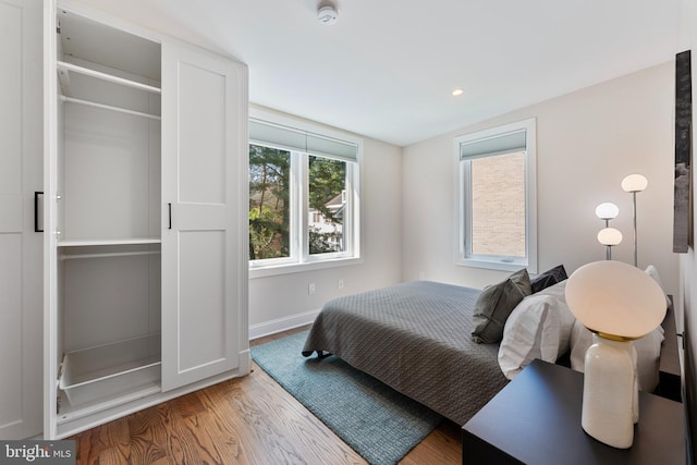 bedroom featuring hardwood / wood-style flooring