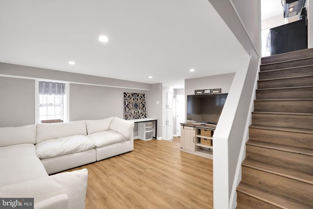 unfurnished living room featuring light hardwood / wood-style flooring