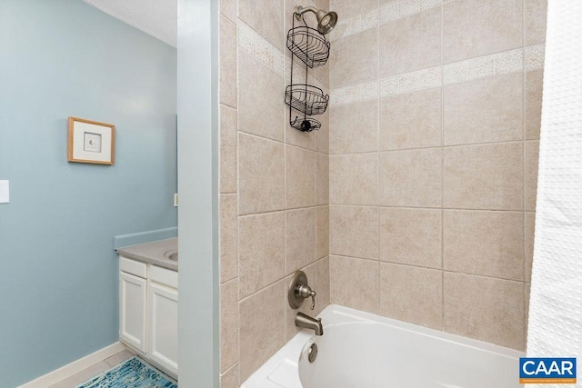 bathroom with shower / tub combo and vanity