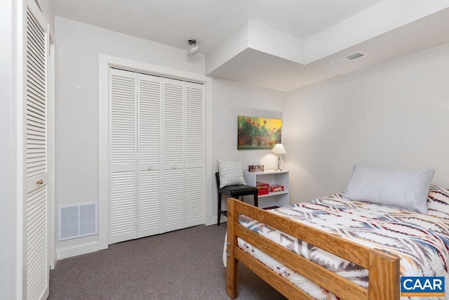 carpeted bedroom featuring a closet