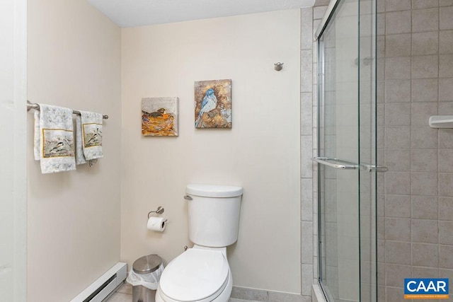 bathroom with toilet, a baseboard heating unit, and walk in shower