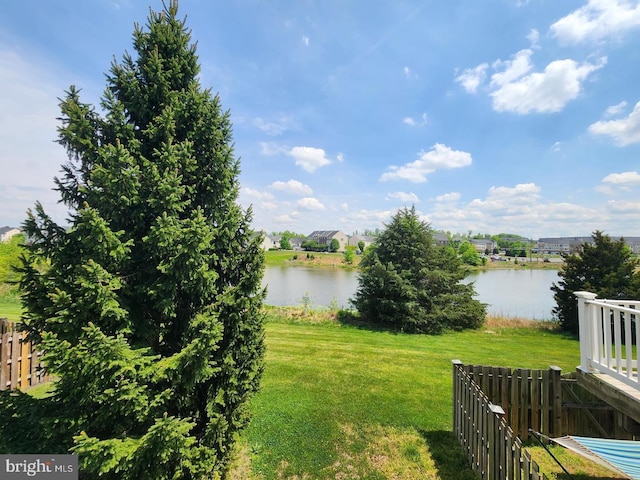 view of water feature with fence