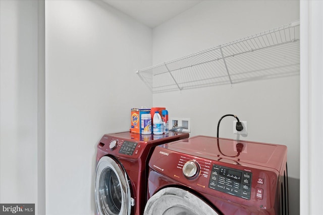 laundry area featuring washing machine and dryer