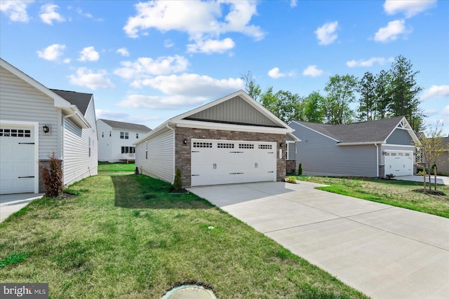 view of front of property featuring an outbuilding, a front lawn, and a garage