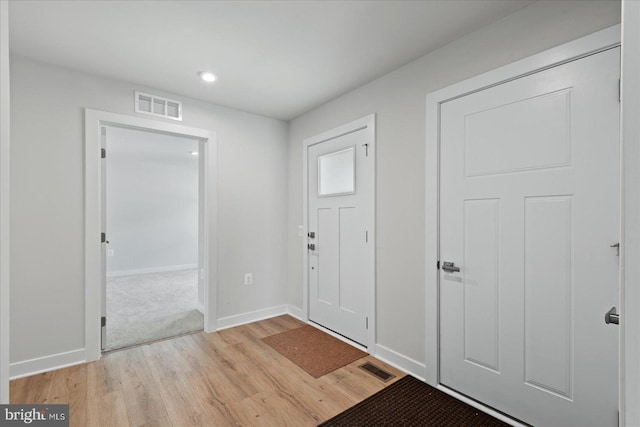 foyer entrance featuring light wood-type flooring