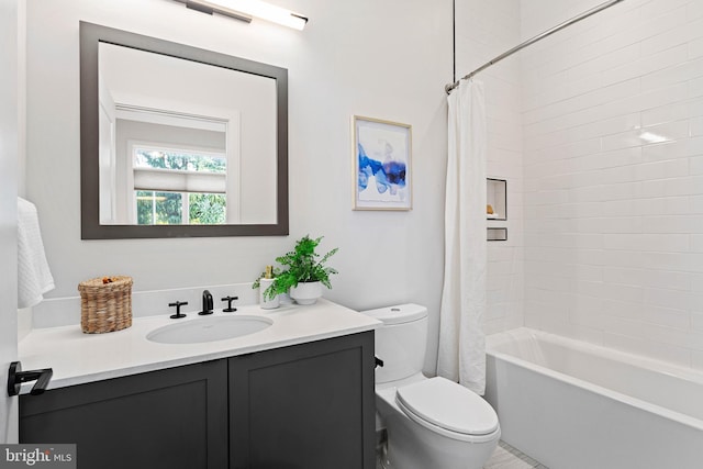 full bathroom with toilet, shower / bathtub combination with curtain, and vanity