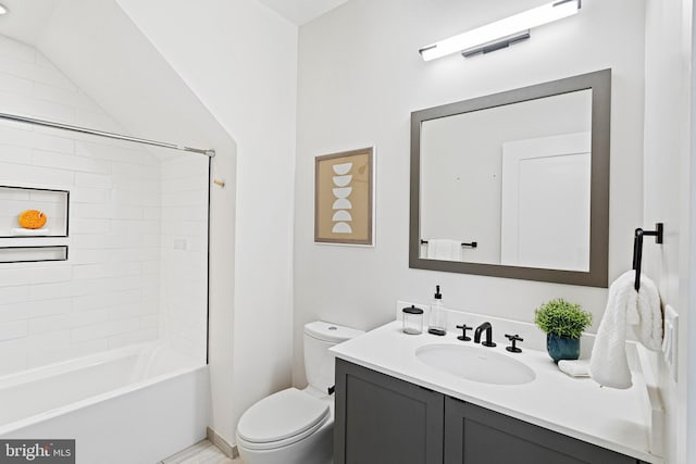 full bathroom with shower / bath combination, toilet, and vanity