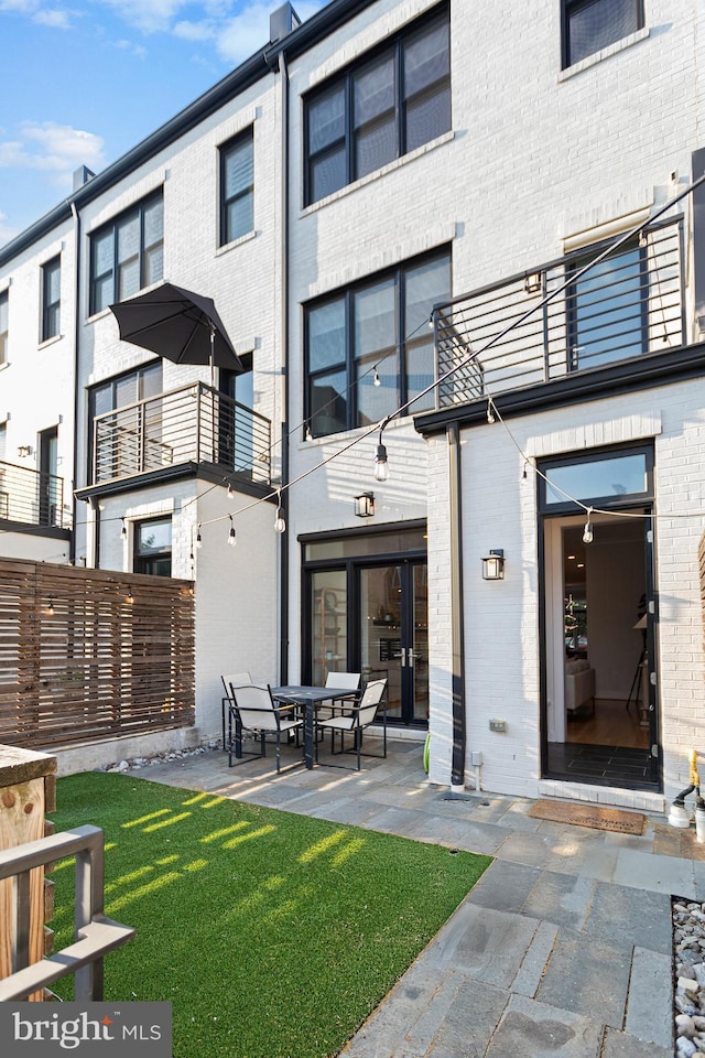 back of house featuring a patio