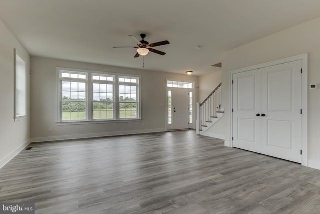 interior space featuring ceiling fan and light hardwood / wood-style flooring