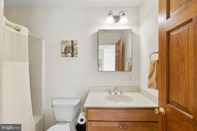 full bathroom with toilet, shower / bath combination with curtain, and vanity