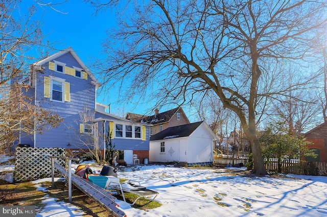 view of snow covered property