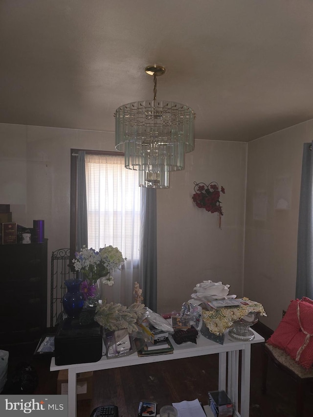 dining area featuring a chandelier