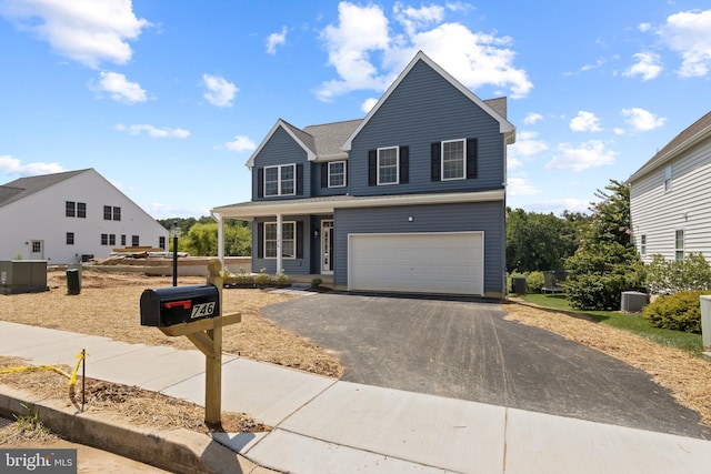 front of property featuring a garage