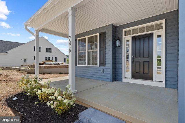 entrance to property with a porch