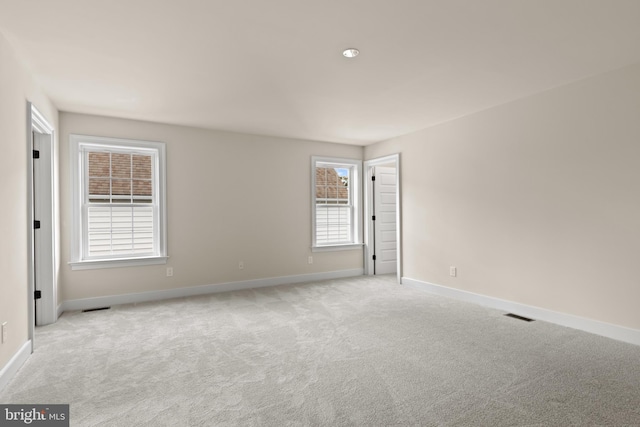 view of carpeted spare room