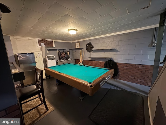 playroom featuring pool table and concrete flooring