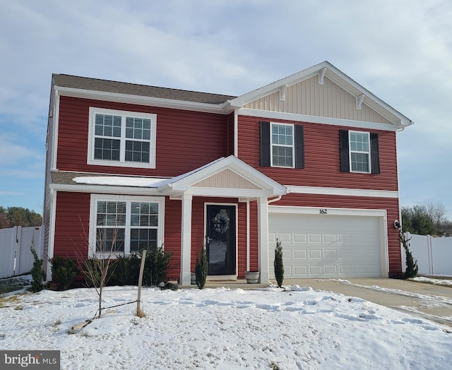 view of front of property with a garage