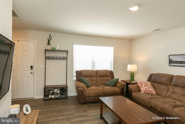 living room featuring dark hardwood / wood-style floors