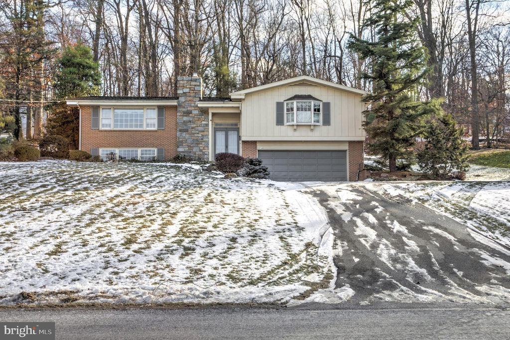 split level home with a garage