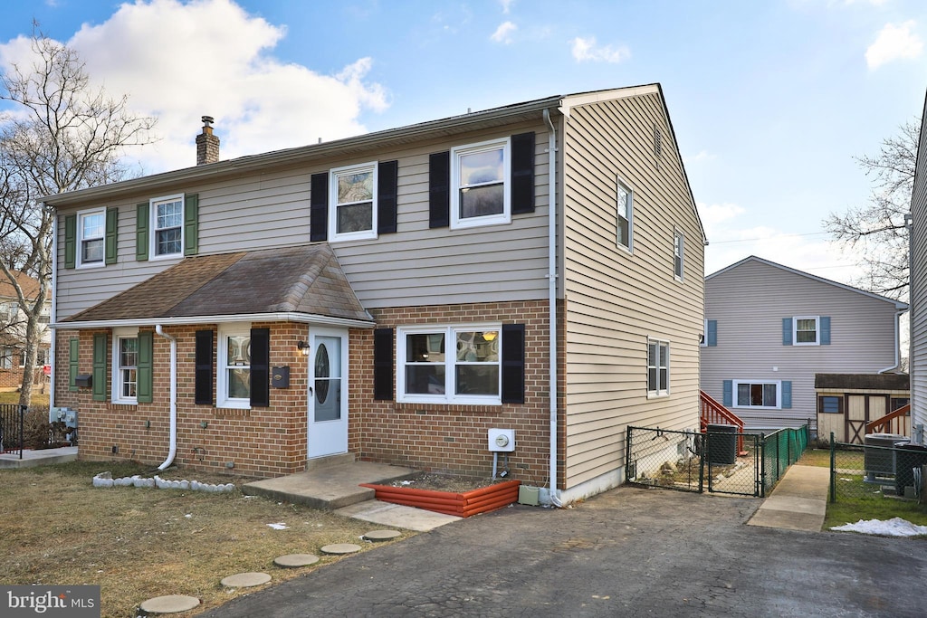 view of front of home featuring central AC unit