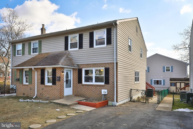 view of front of home featuring central AC unit