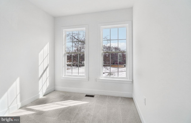 view of carpeted spare room