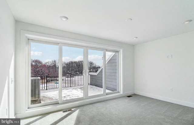 empty room with carpet flooring