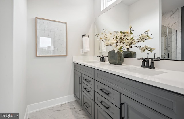 bathroom featuring walk in shower and vanity