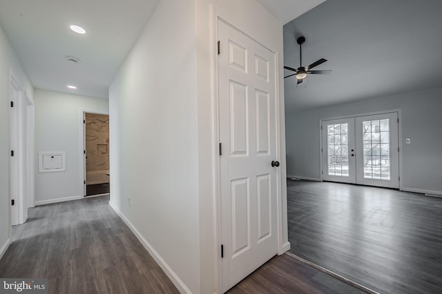 hallway featuring french doors and dark hardwood / wood-style floors