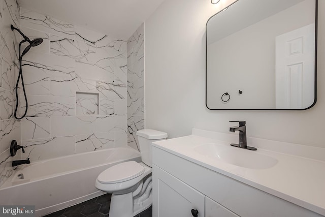 full bathroom featuring toilet, tile patterned flooring, tiled shower / bath, and vanity